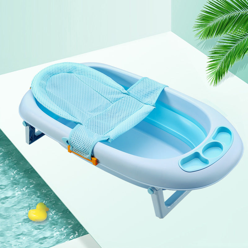 Newborn bath support net holding a baby securely